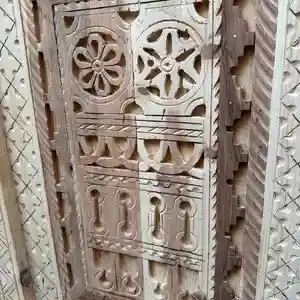 Traditional Moroccan woodcraft scene from Taroudant heritage archives